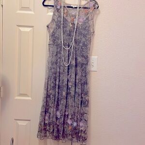 Beautiful lavender embroidered lace with slip dress underneath.Closet clear out.